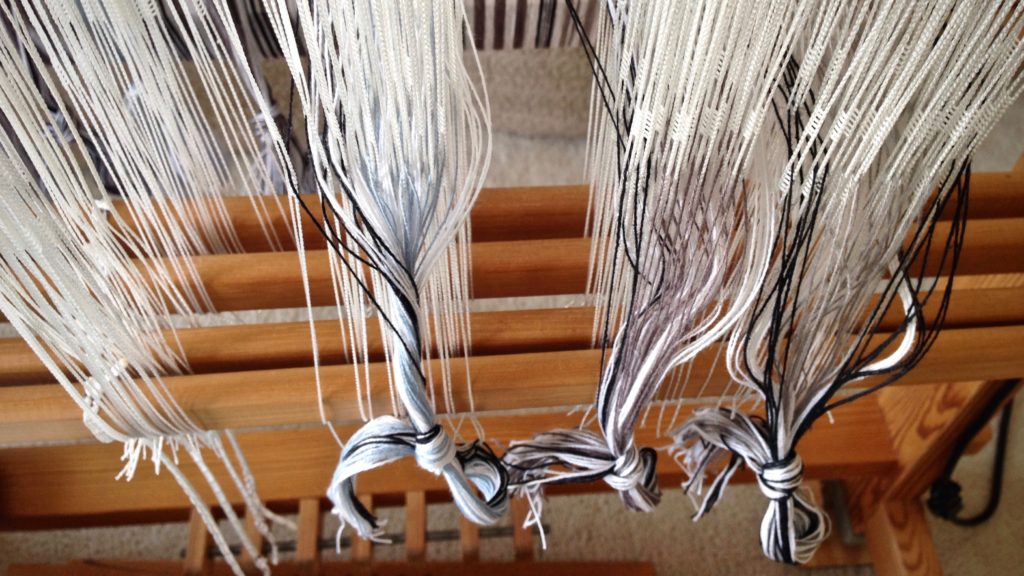 Threading the loom for plattväv towels.