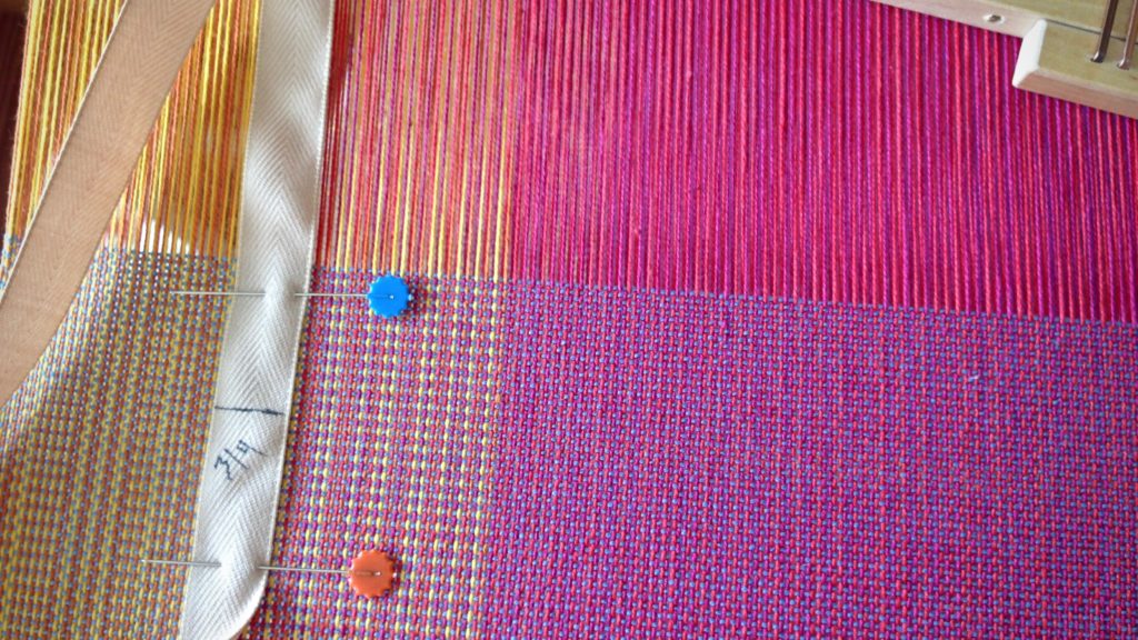 Pre-measured twill tape helps set the pace for the weaving project.