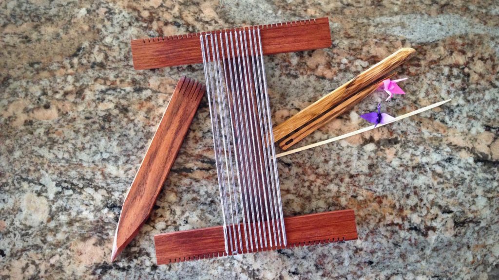 Hockett loom warped for weaving a small tapestry.