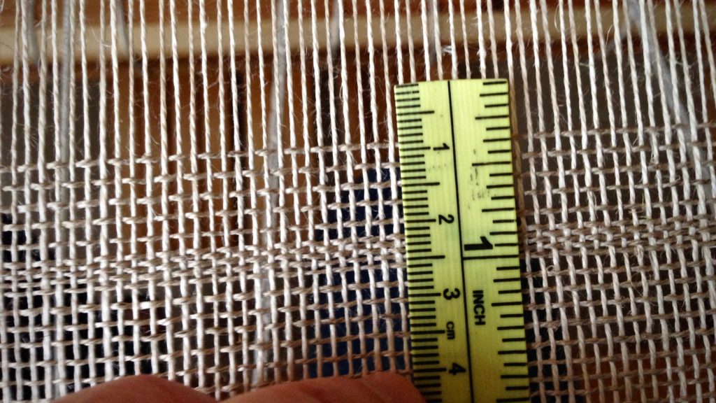 Trying to weave linen at 5 picks per centimeter.