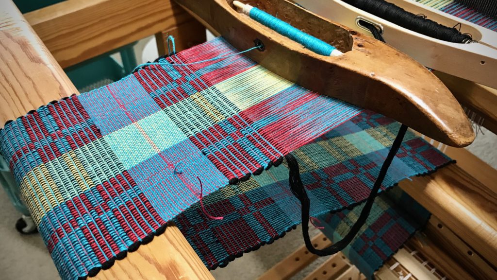 Rep weave mug rugs on the loom.
