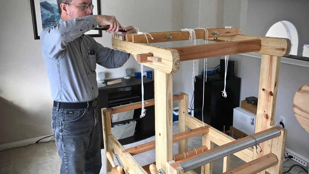 Putting the new little handbuilt loom together!