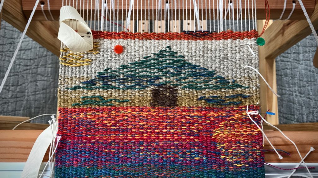 Tapestry and inlay sampler. Spliced warp ends fix frayed threads.