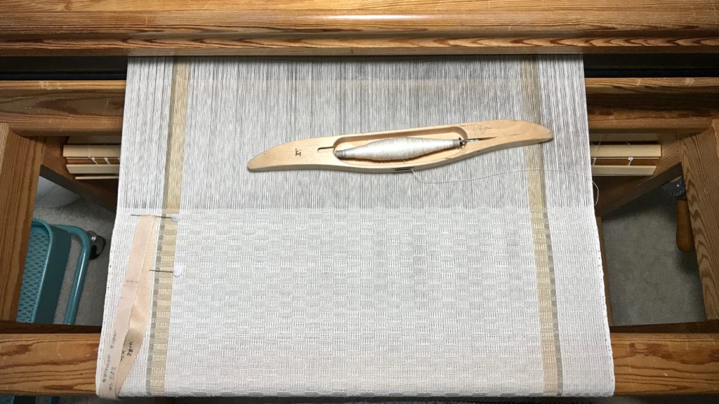 M's and O's long table runner. Linen weft.