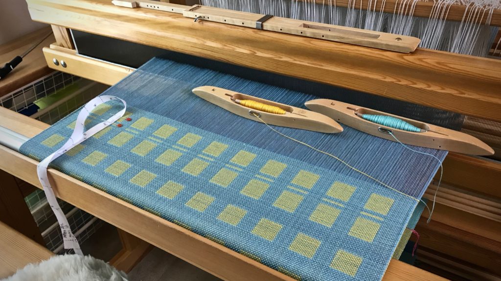 Double weave cotton baby blanket on the loom.