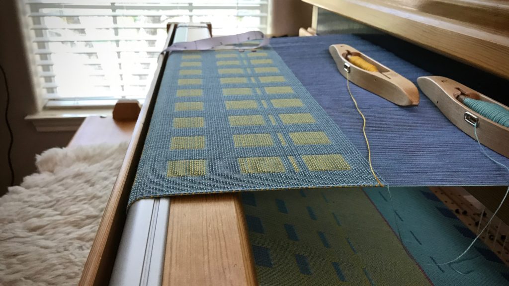 Cotton double weave baby blankets on the loom.