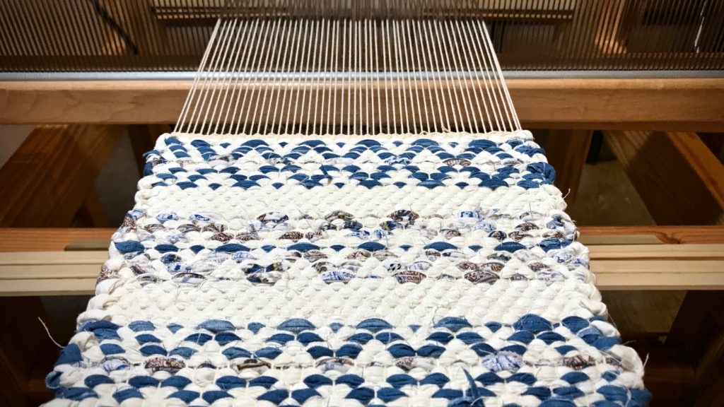 Rosepath rag rug hot pads on the loom.