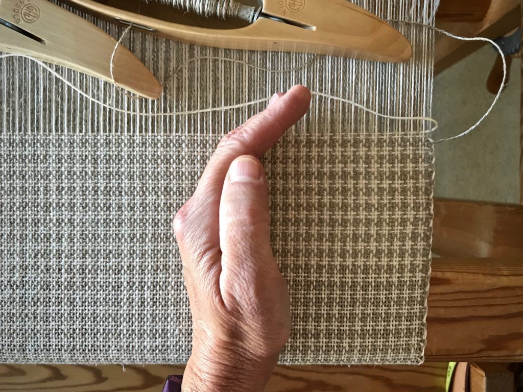 Shadow reveals the pattern in this linen color and weave.