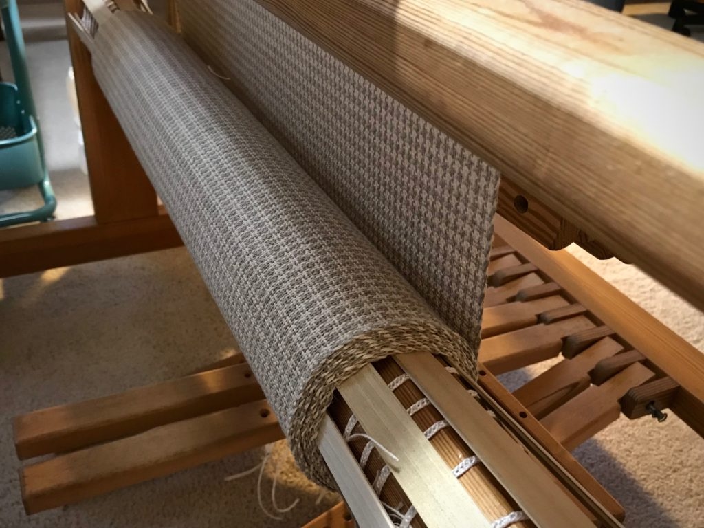 Linen on the cloth beam.