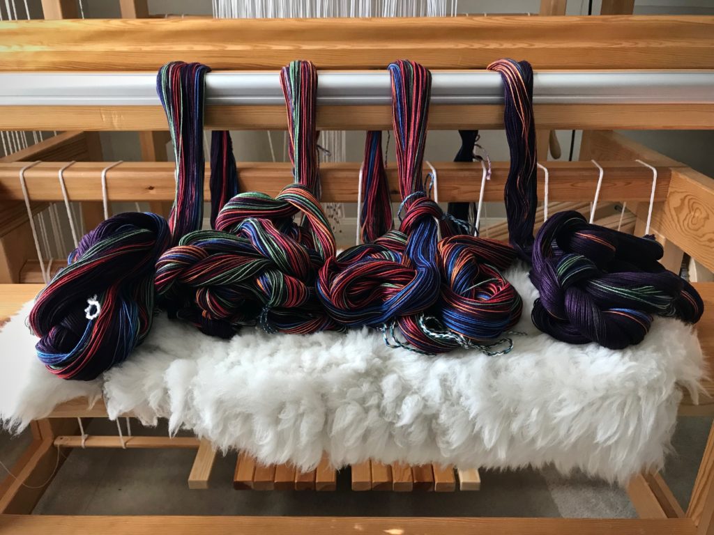Four warp bouts for double weave throw.