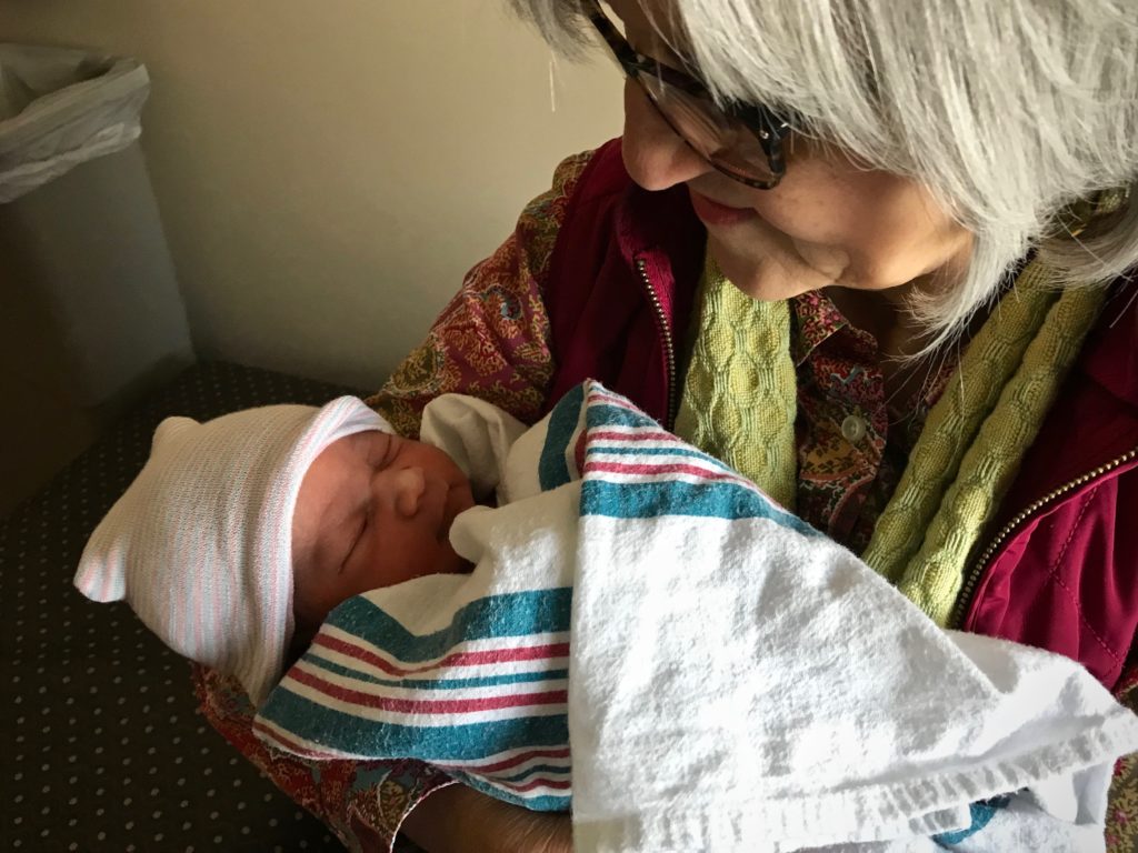 New grandbaby, sweet moment.