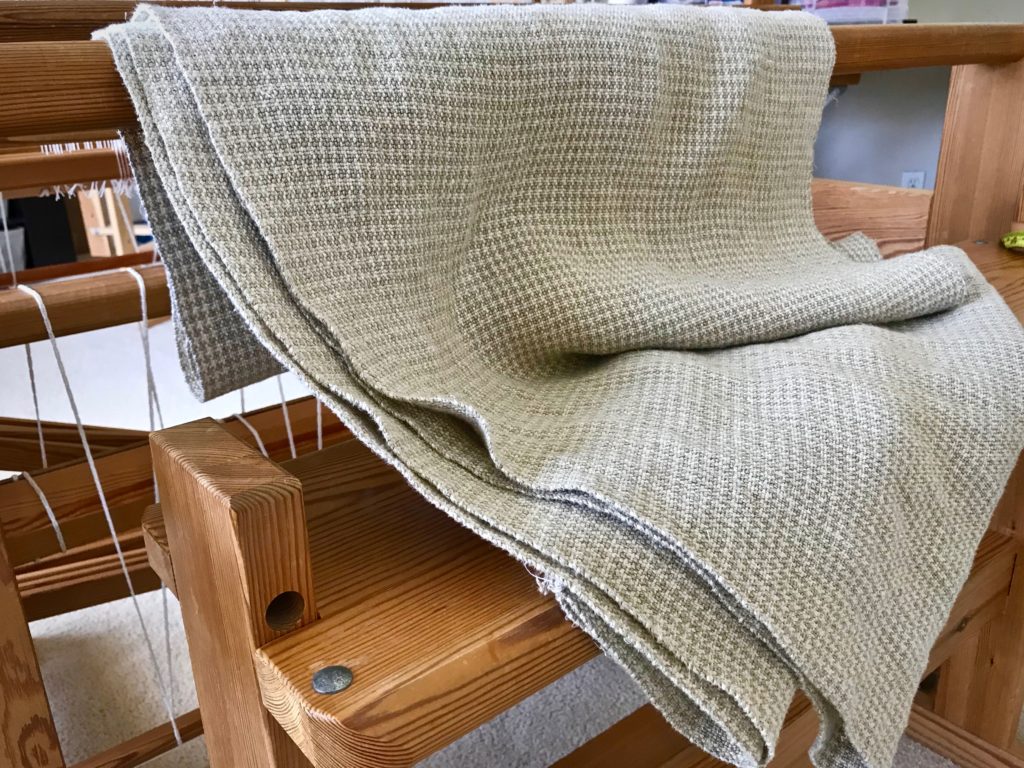 Just woven custom linen upholstery fabric.