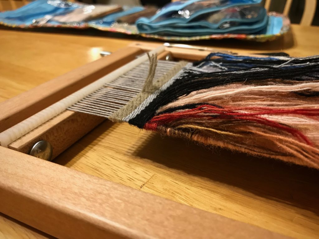 Ending a small frame loom tapestry.