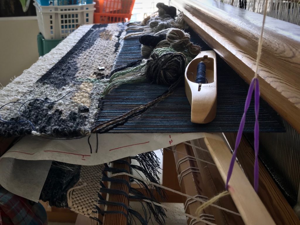 Four-shaft tapestry in progress on the loom.