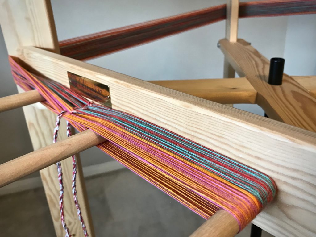 Warping reel. Winding a new colorful warp!