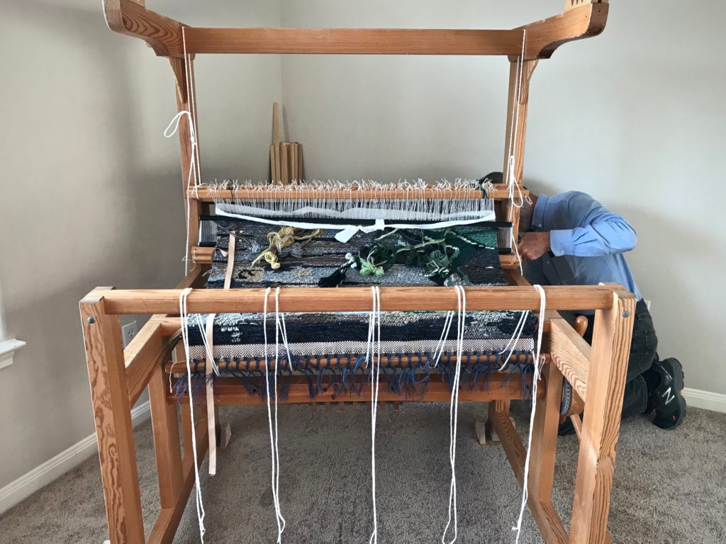 Removing the warp beam. Relocating the loom.