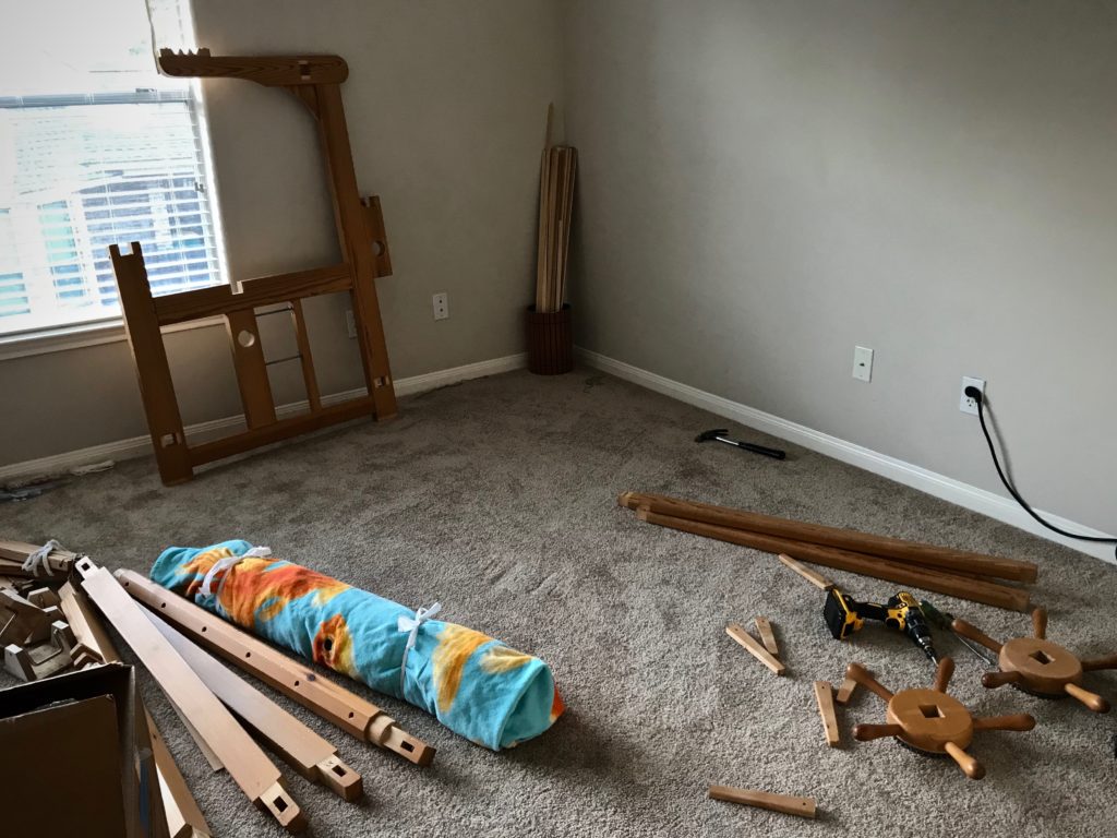 Taking the loom apart.