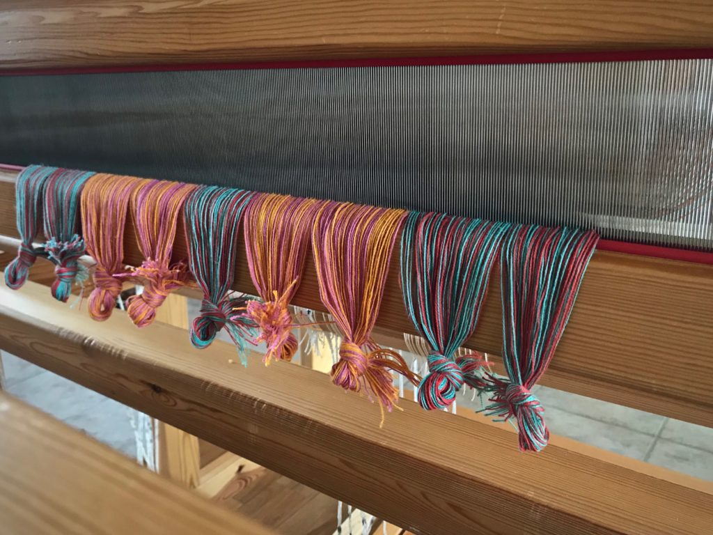 Reed is sleyed. Dressing the loom for double-weave towels.