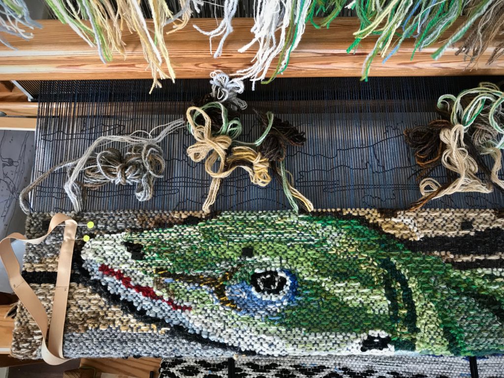 Lizard tapestry. Top of the head almost finished.