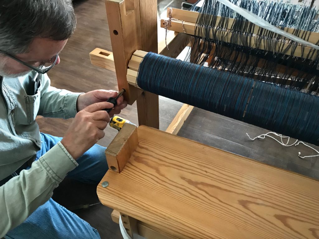 Re-assembling my loom after relocating.