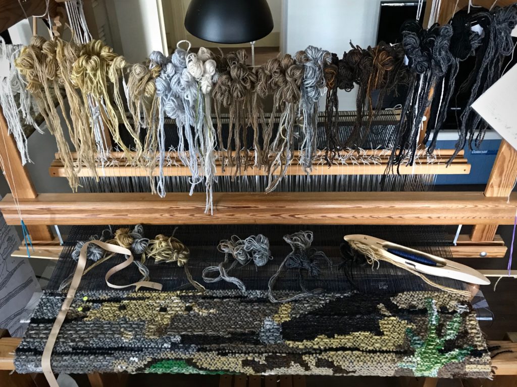 Weaving four-shaft tapestry on a Glimakra Ideal loom.