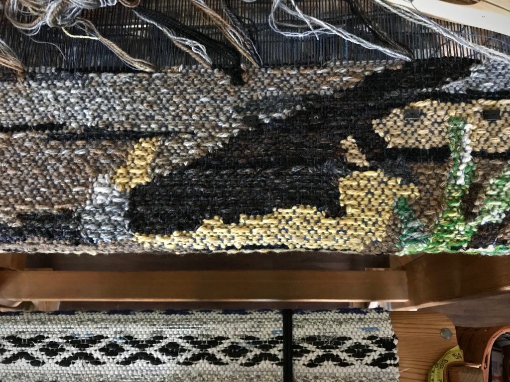 Detail of lizard tapestry.