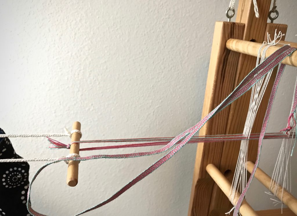 Weaving hanging tabs for towels on my Glimakra band loom.