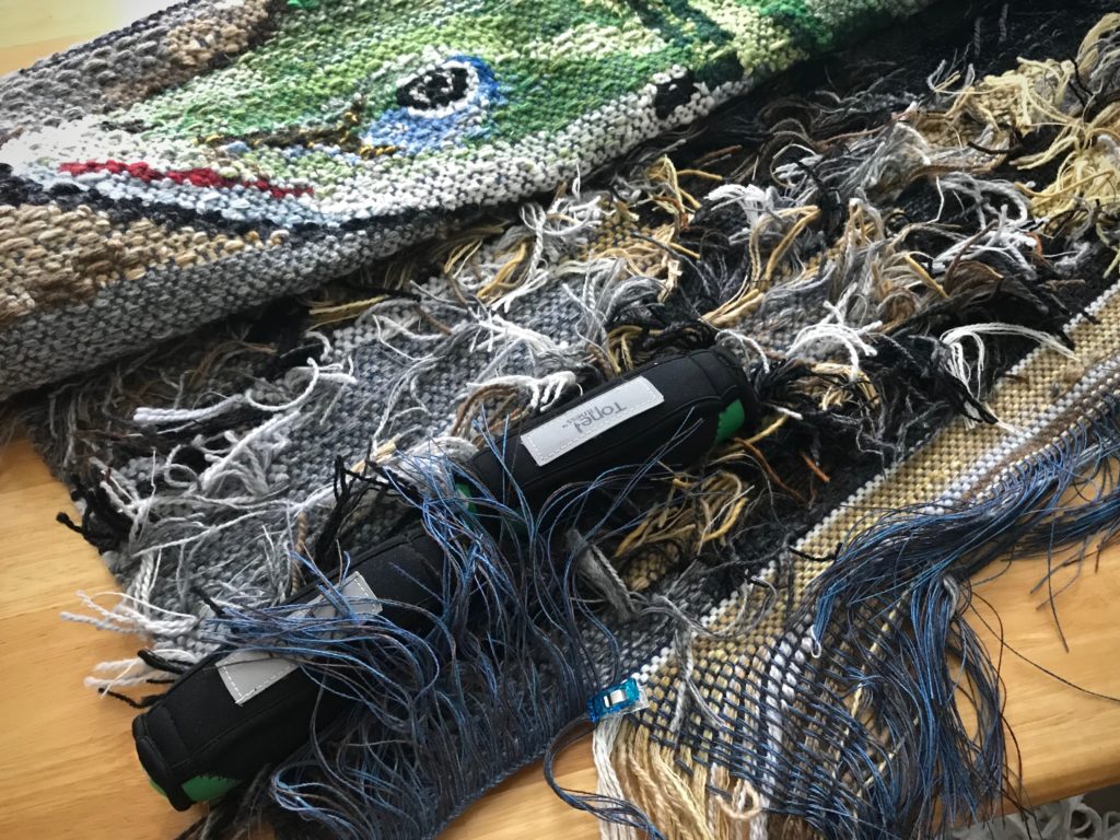 Finishing the ends on the Lizard tapestry.