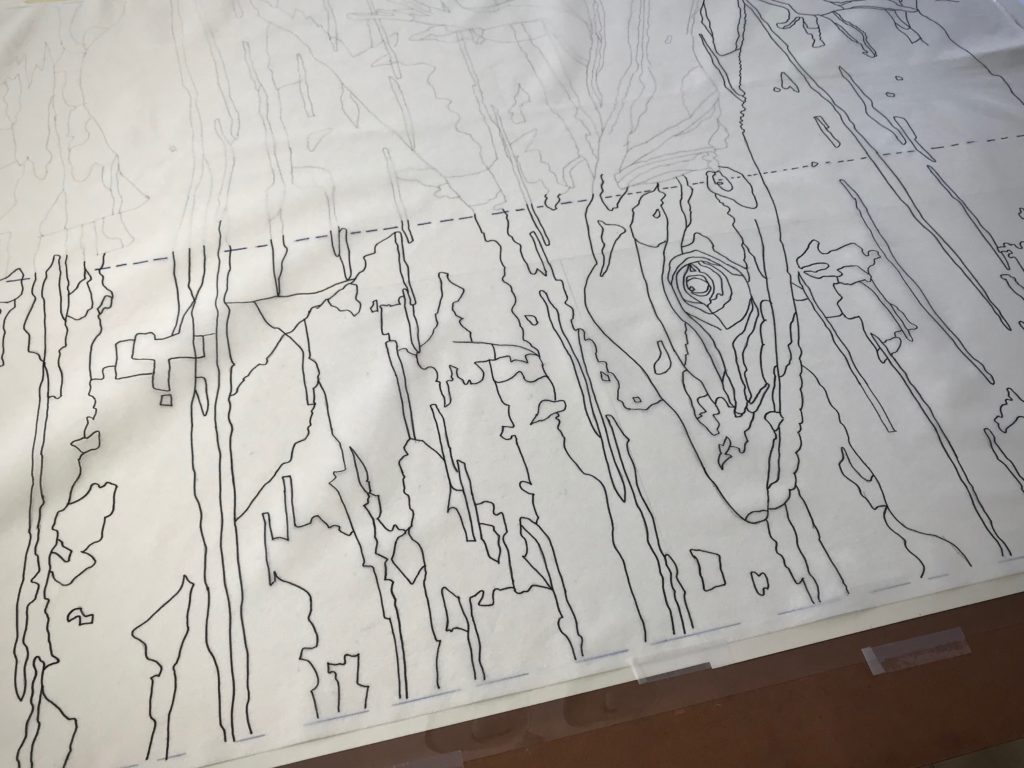 Making a tapestry cartoon.