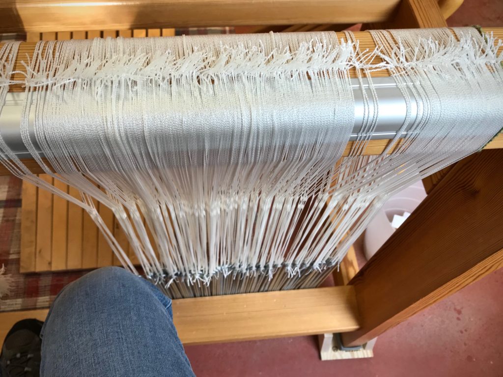 Drawloom pattern heddles. Sorting into units.