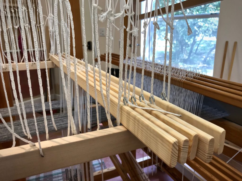 Adding pattern shafts to the drawloom.