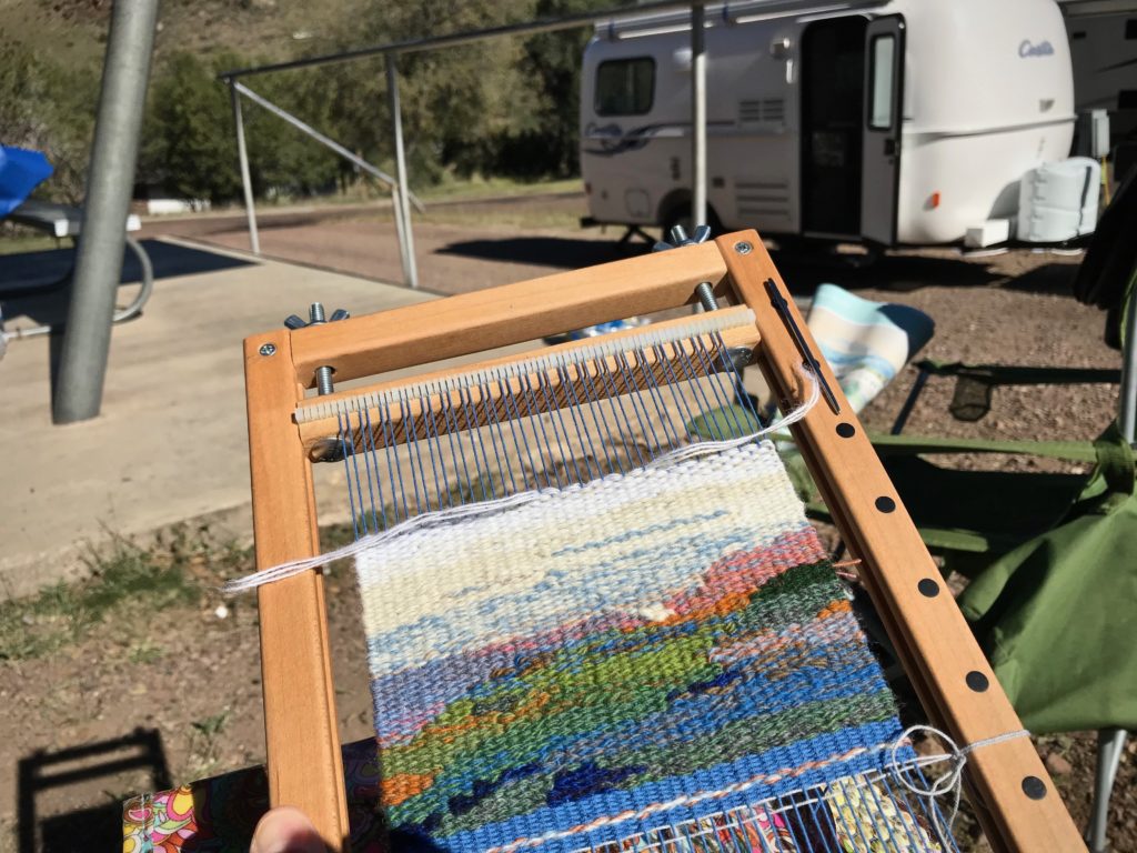 Weaving in the sunshine on a camping trip.