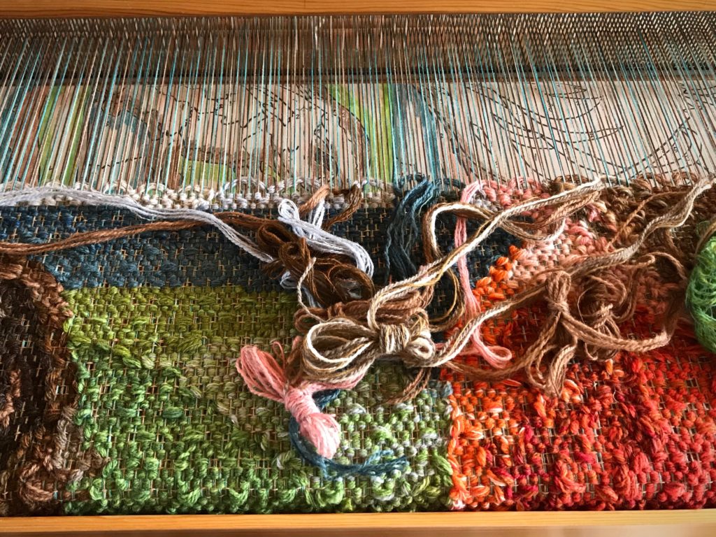 Beginning the bunny in the large pictorial tapestry.