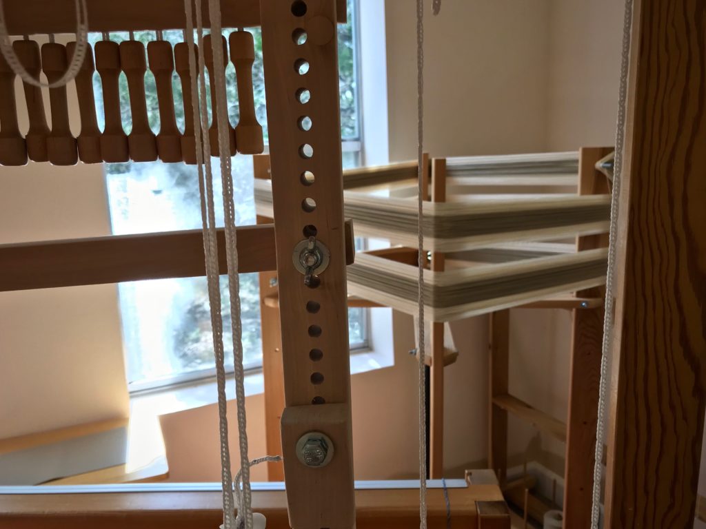 Winding a warp for the next drawloom project.