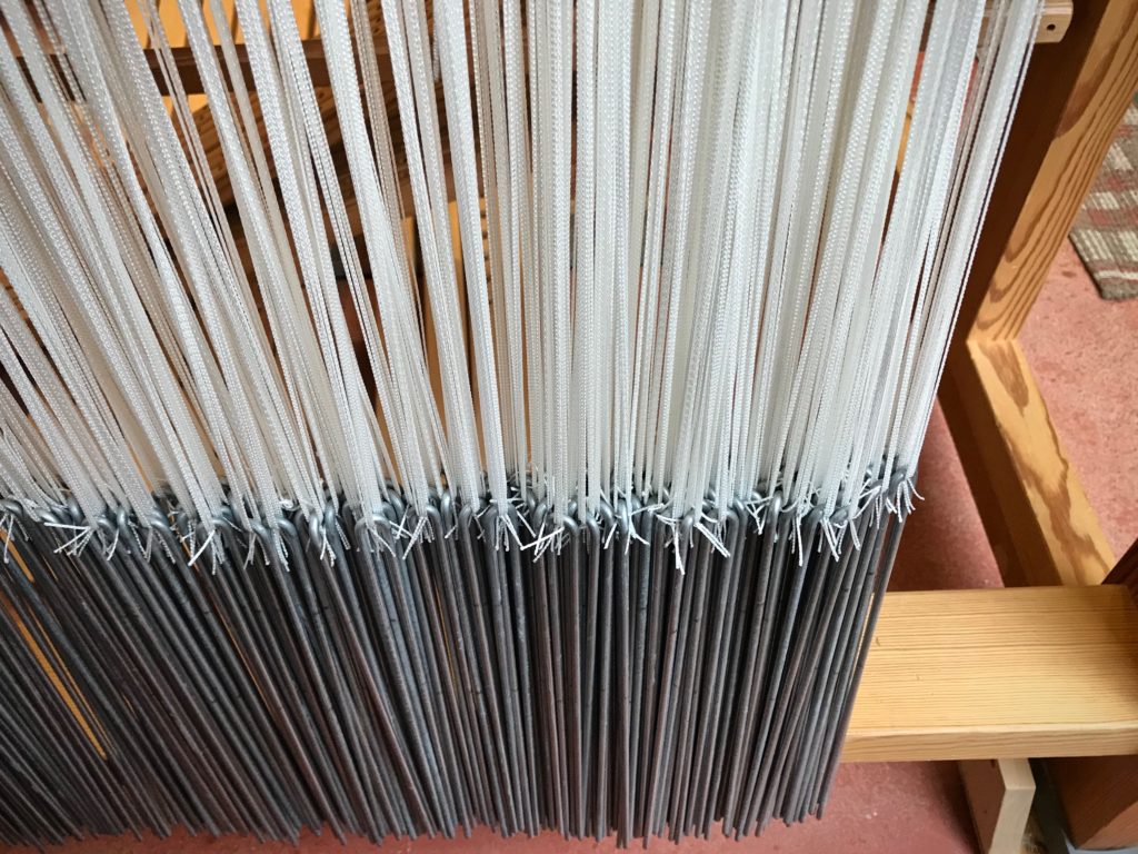 Pattern heddles and weights for prepping the drawloom.