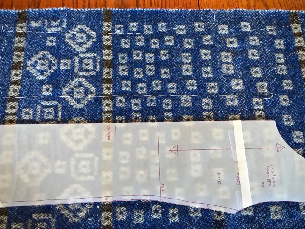 Cutting lines marked with basting stitches.