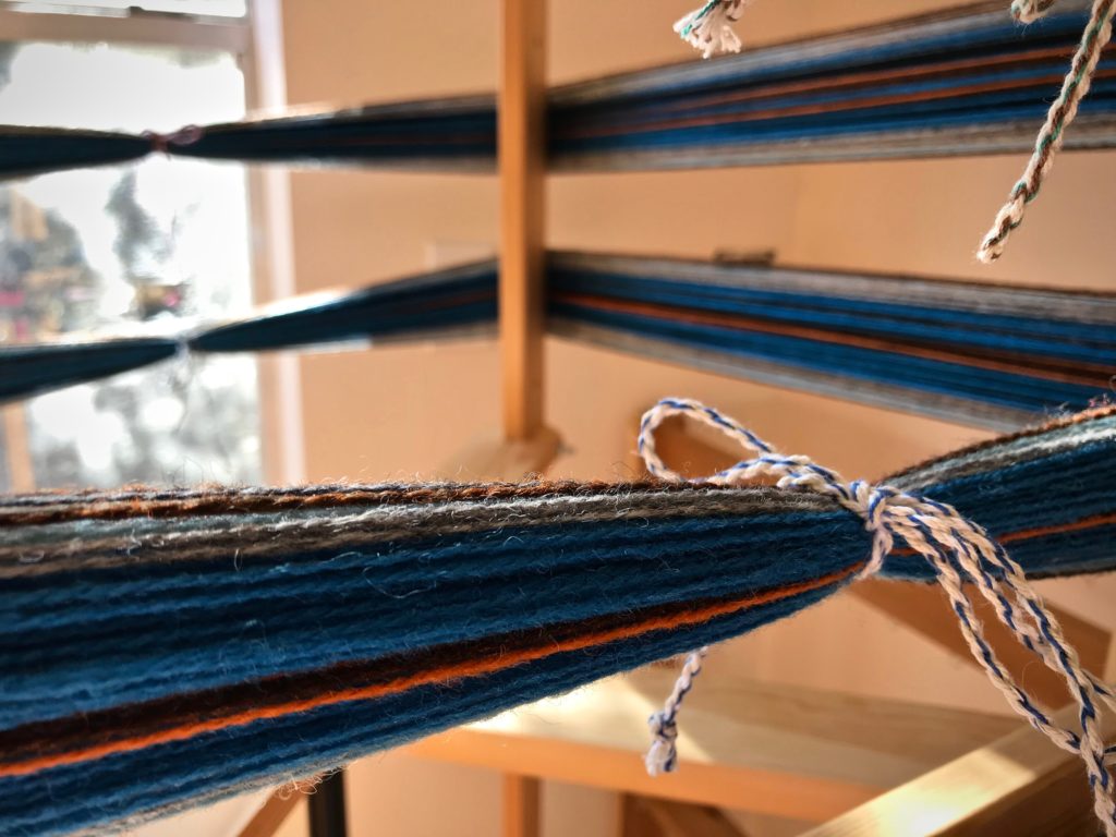 New warp on warping reel for winter scarves.