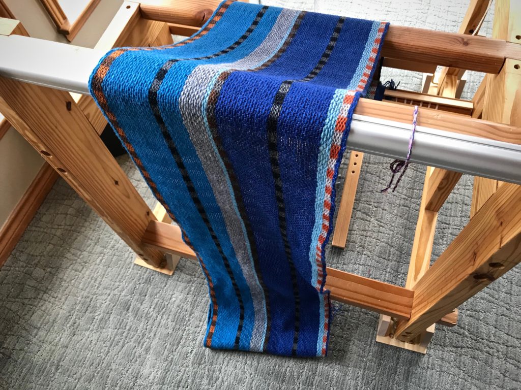 Two new wool scarves coming off the loom!