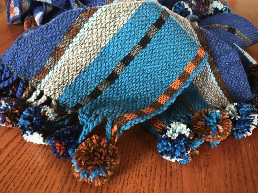 Handwoven scarves with pompoms!