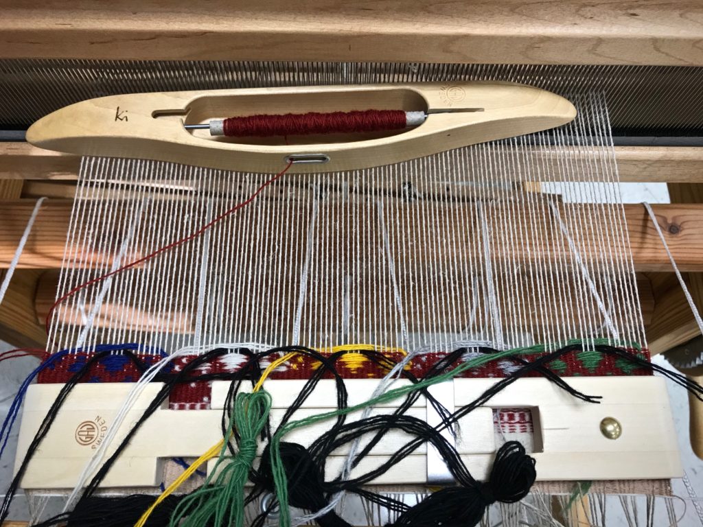 Weaving Krabba, a Swedish art weave.