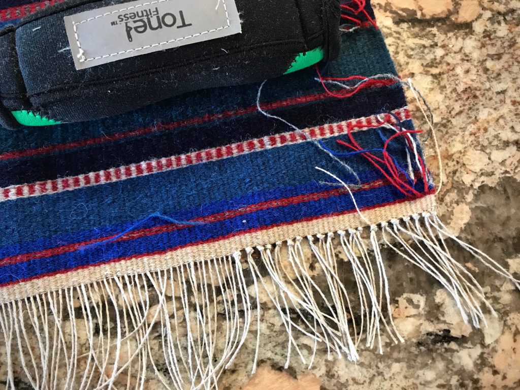 Making a handwoven wool bag.