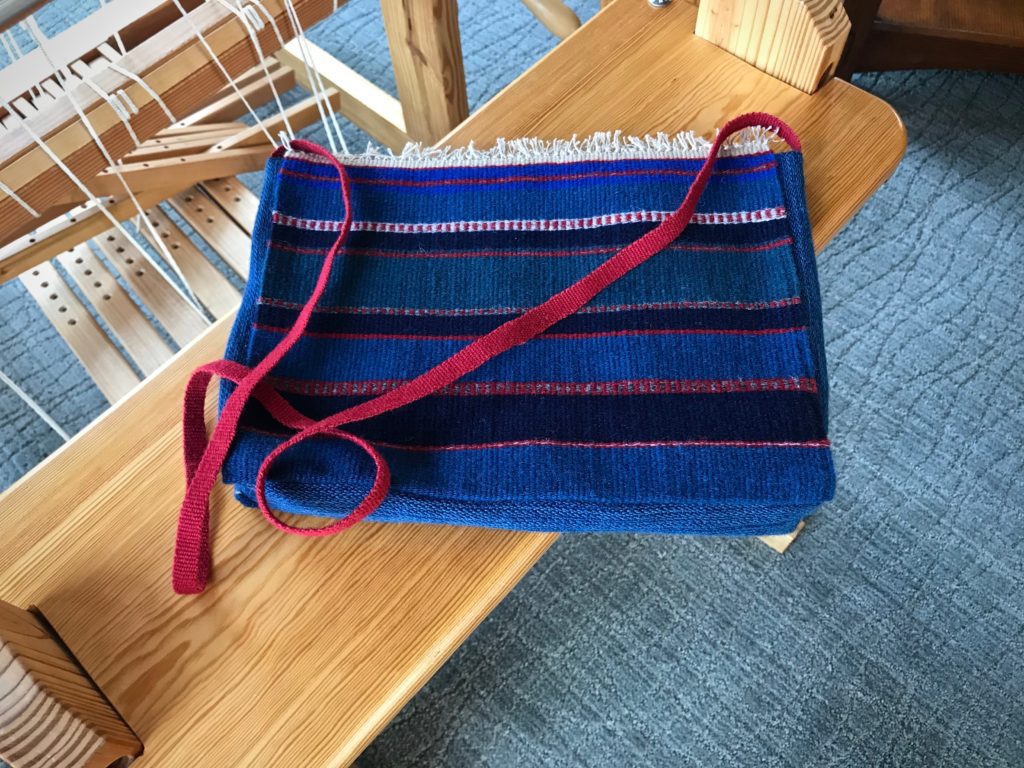 Handwoven shoulder bag.