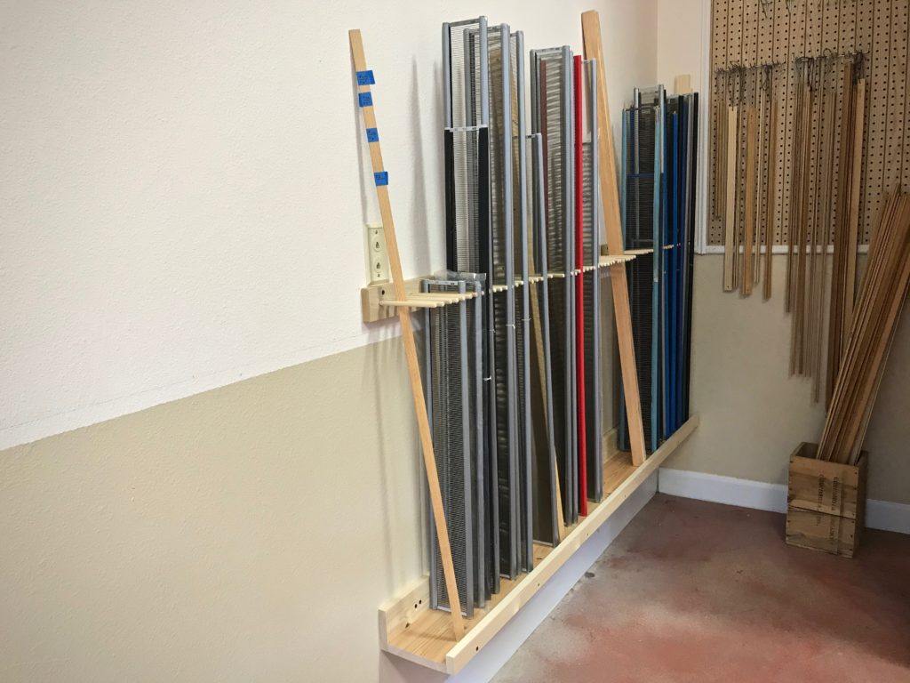 Reed holder stores weaving loom reeds. DIY