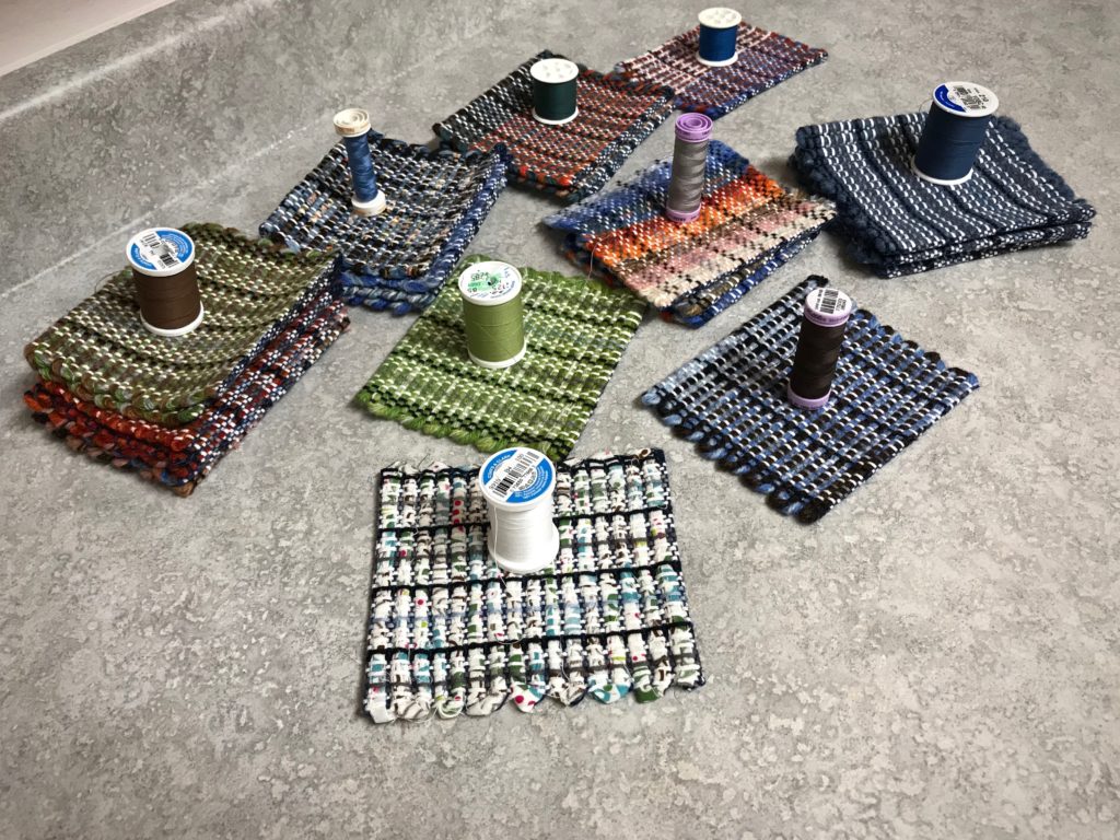 Making handwoven mug rugs.