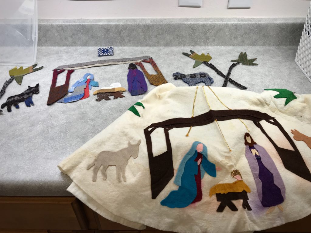 Making a handwoven Christmas tree skirt.