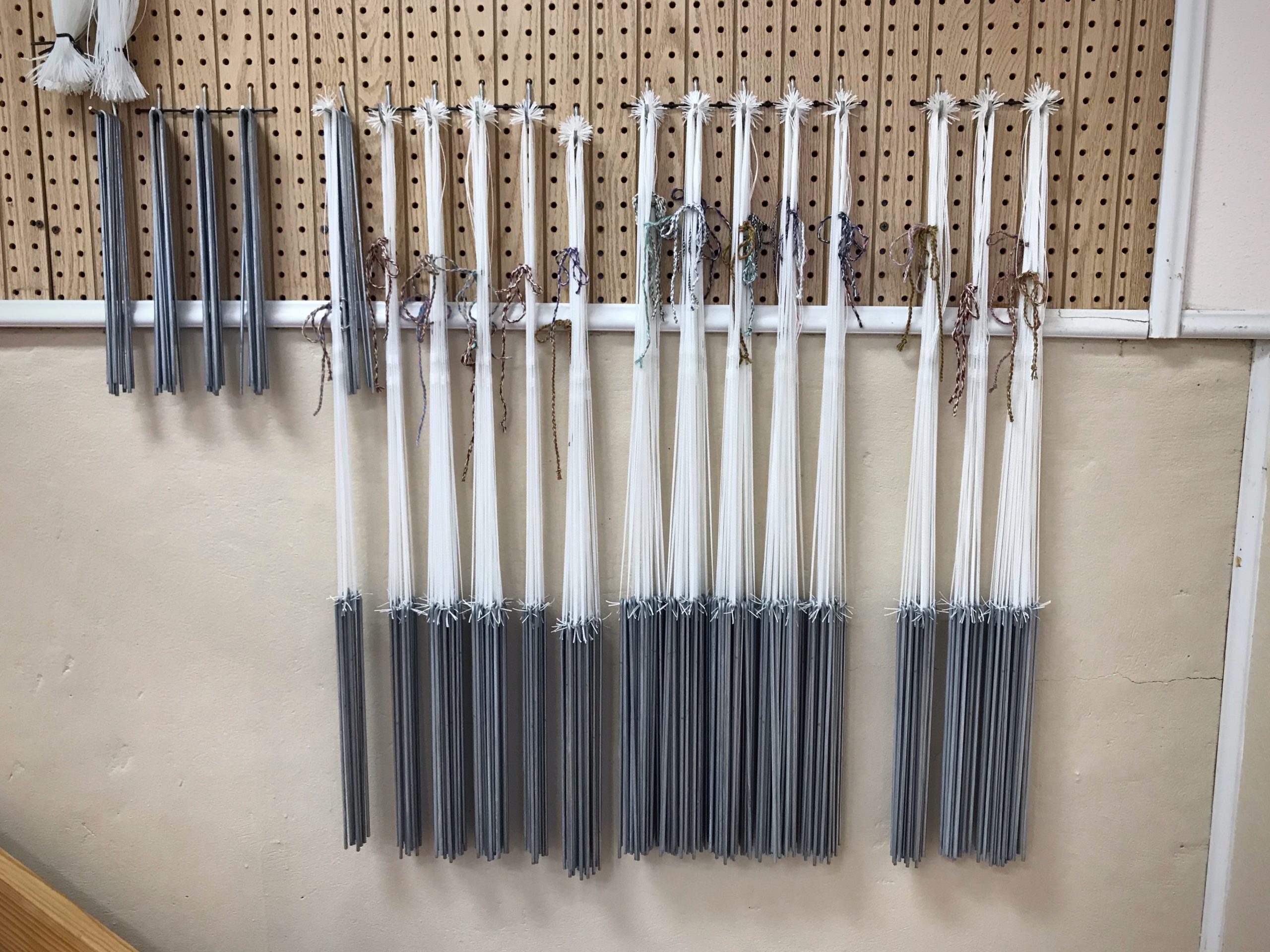 Long heddles and lingos for the drawloom.