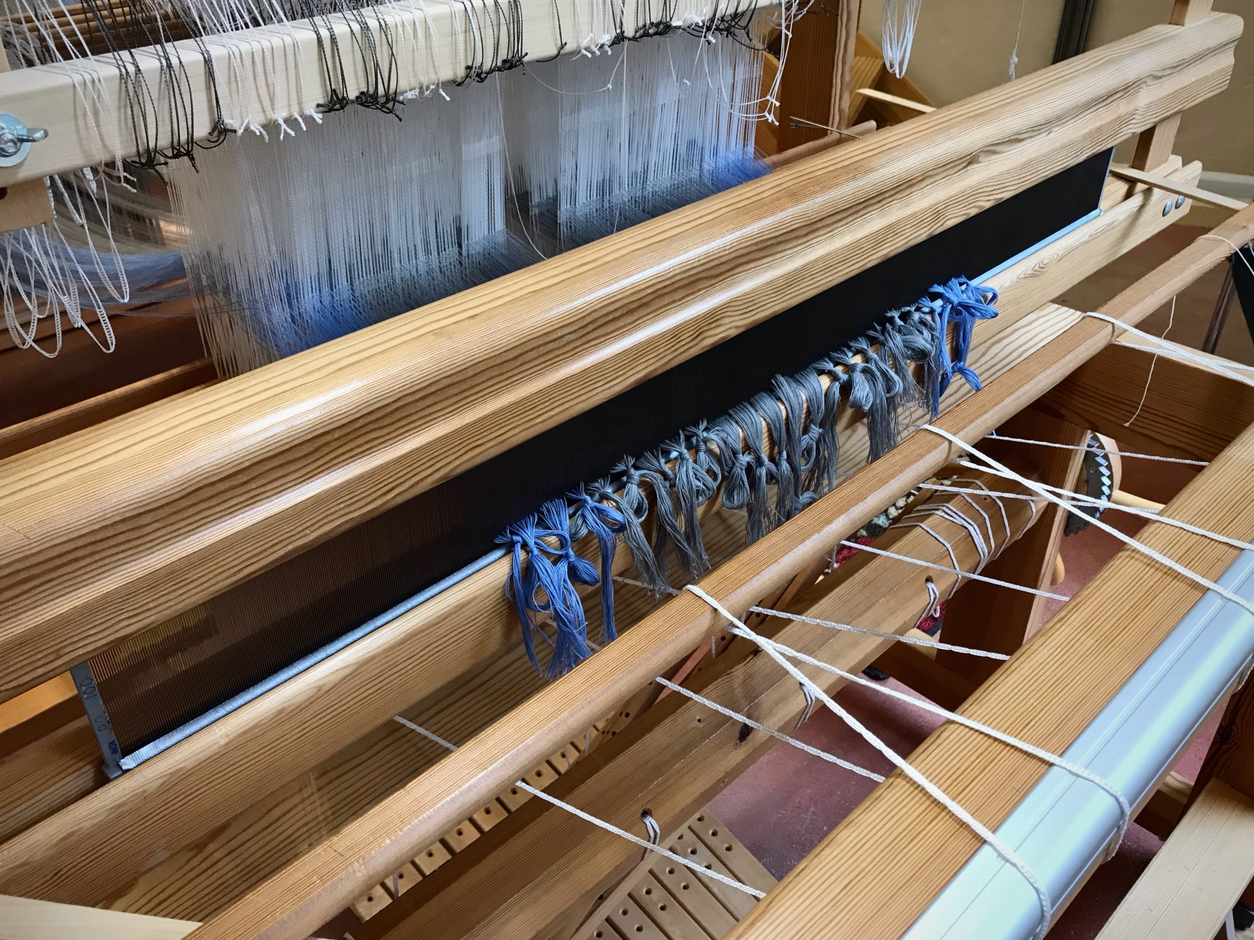 Getting ready to tie on the warp on the combo drawloom.