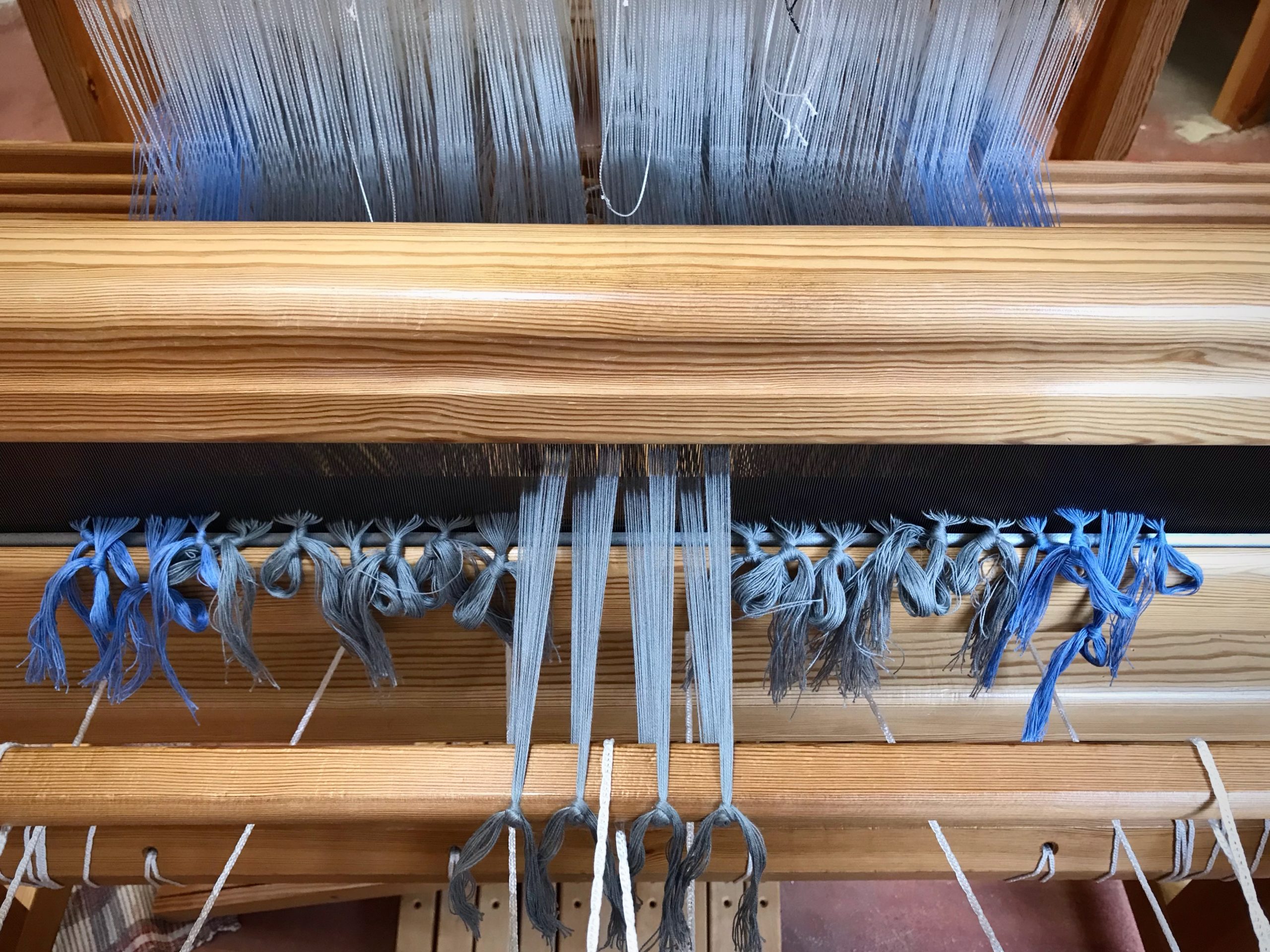 Getting the drawloom ready to weave.