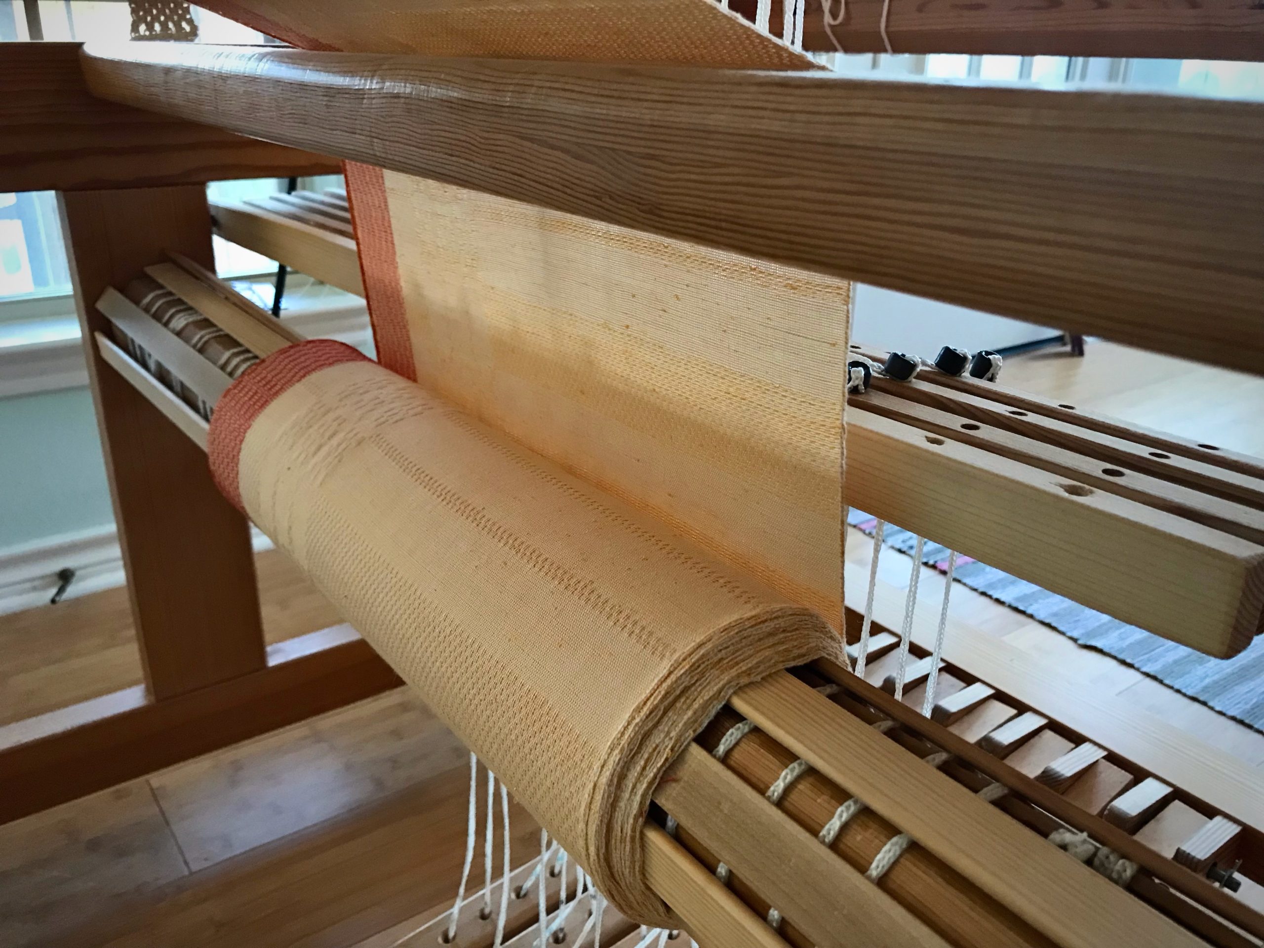 Cloth beam on the Glimakra Ideal loom.