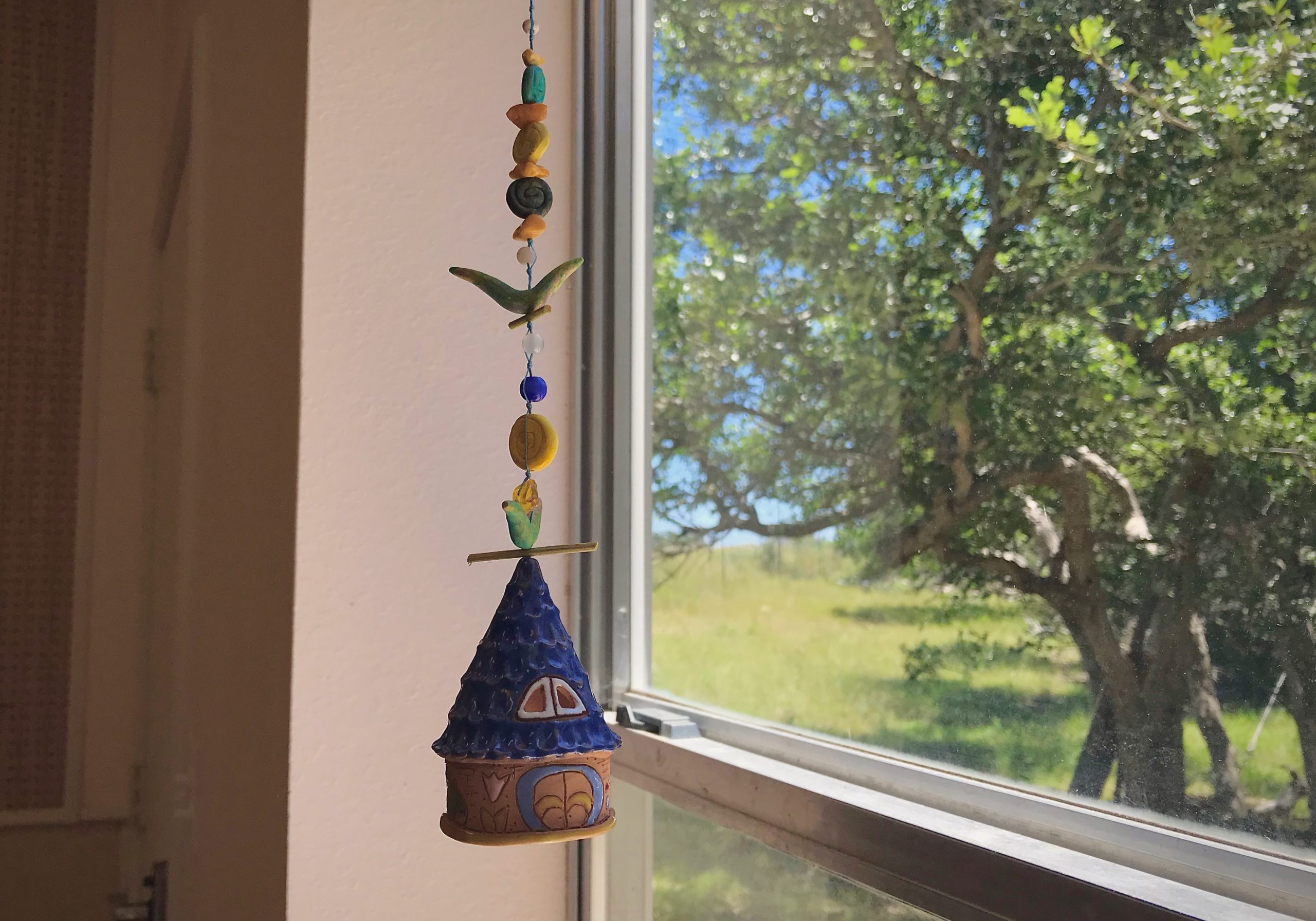 Ceramic bell from my trip to Germany. Whimsical house.